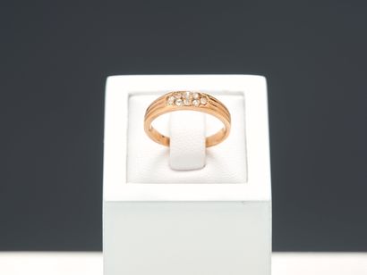 Bague en or rose 18k 750 millièmes ornée...