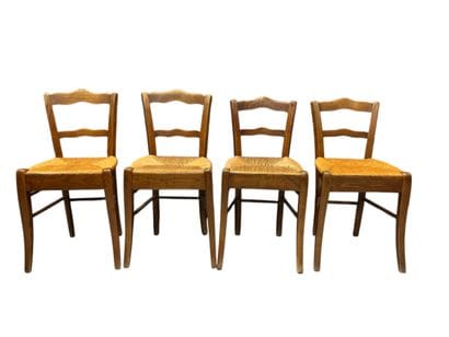 Suite de quatre chaises basses en bois rustique,...