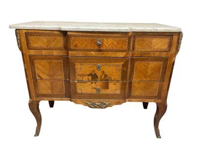 Commode en bois de placage à décor de frisage...