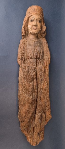Epreuve en bois sculpté et plâtre partiellement...