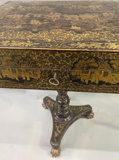 A Coromandel lacquer game table decorated...