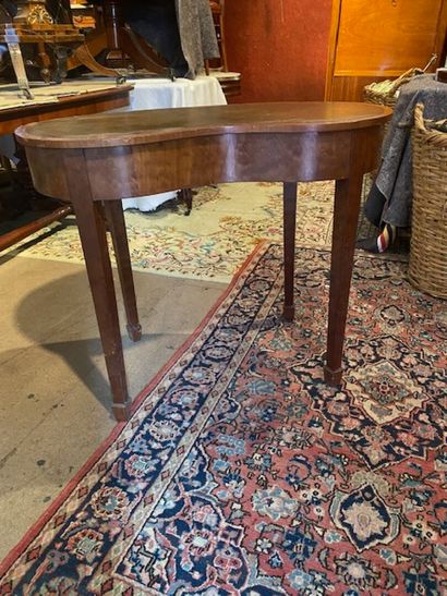 A mahogany and mahogany veneered kidney-shaped...