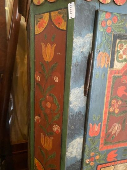 A polychrome lacquered pine wedding armoire
It...