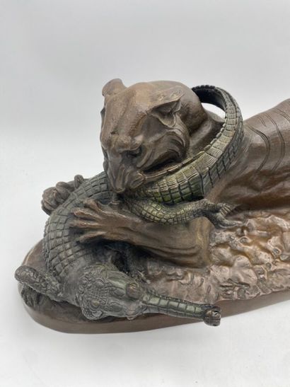 After BARYE - A lion devouring a crocodile
Bronze...