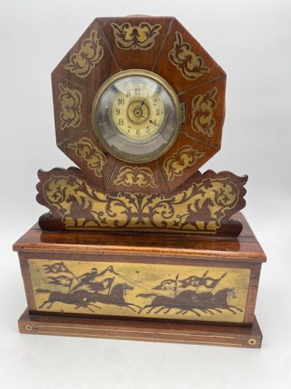A rosewood and rosewood veneer clock with...