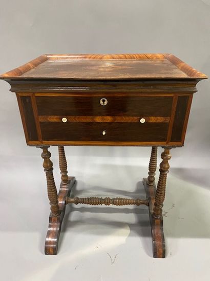 A knitting table in rosewood and violet wood...
