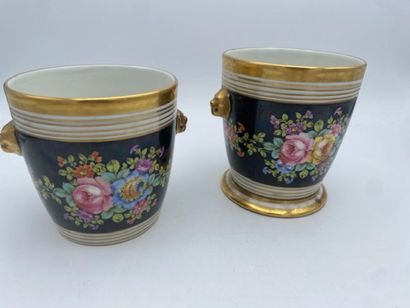 PARIS 
A pair of porcelain flowerpot holders...