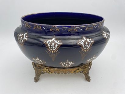 SARREGUEMINES
An earthenware jardinière with...
