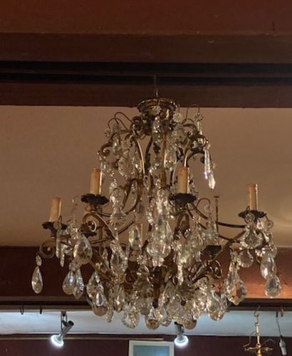 Ten-arm gilt bronze chandelier with pendants...