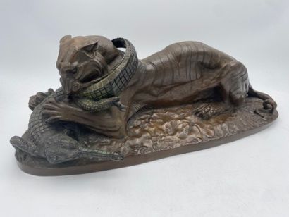After BARYE - A lion devouring a crocodile
Bronze...