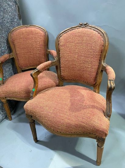 A pair of cabriolet armchairs in molded natural...