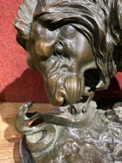 After BARRY 
The lion and the snake in bronze...
