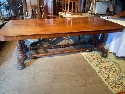 A mahogany and mahogany veneered dining table...