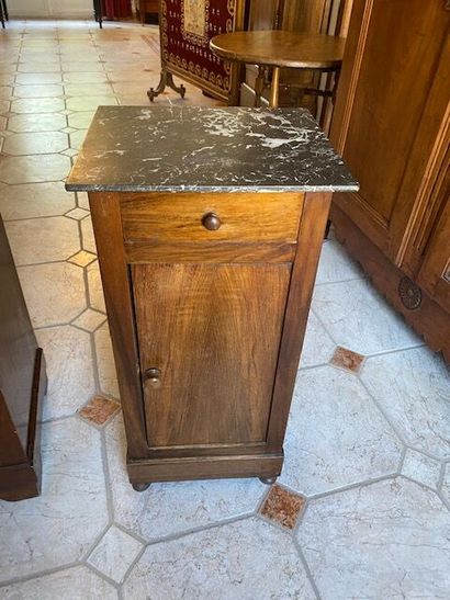 A walnut bedside cabinet with grey breche...