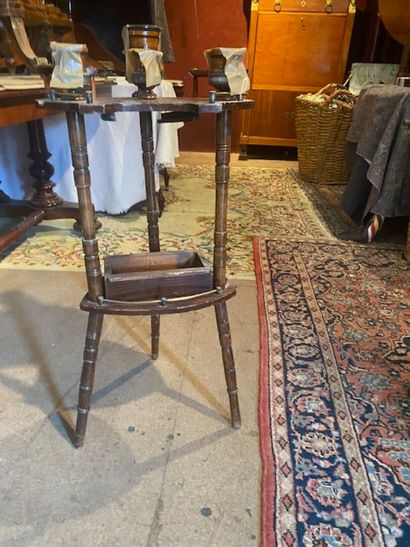 A turned and lacquered wood pipe table
Early...
