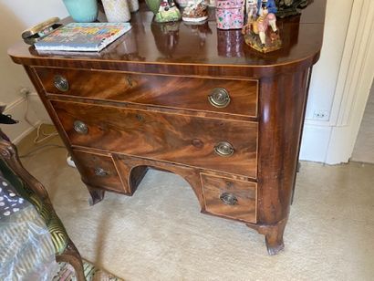 A mahogany and mahogany veneered chest of...