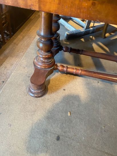 A mahogany and mahogany veneered dining table...