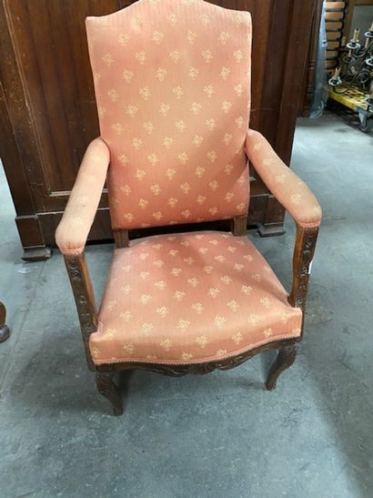 Armchair in molded natural wood, carved with...