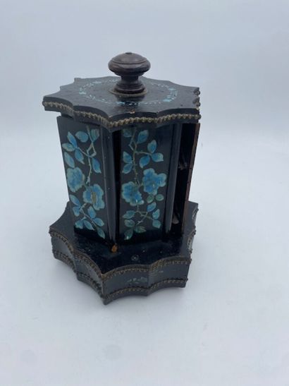 A small blackened wood cigar cabinet in blue...