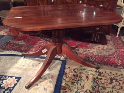 Mahogany and mahogany veneer shutter table.
It...