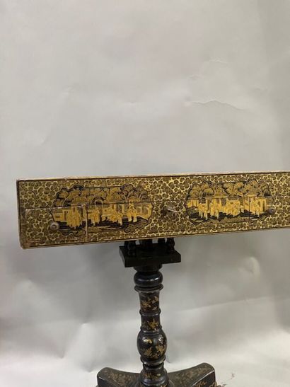 A Coromandel lacquer game table decorated...