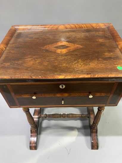 A knitting table in rosewood and violet wood...