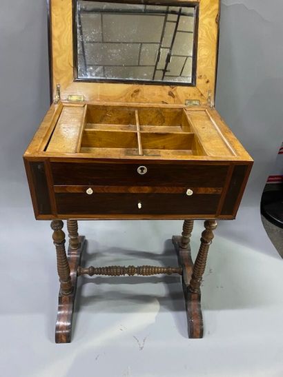 A knitting table in rosewood and violet wood...