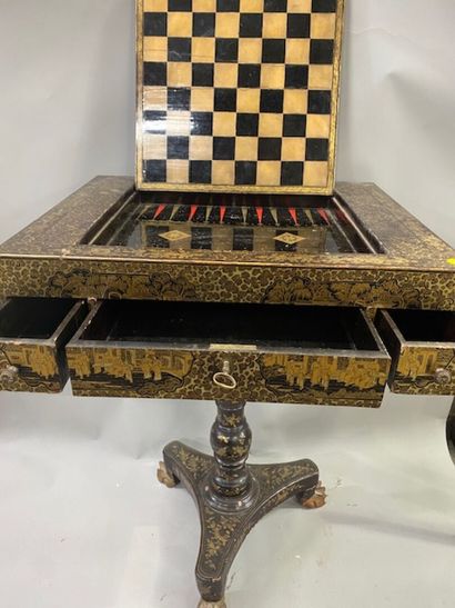 A Coromandel lacquer game table decorated...