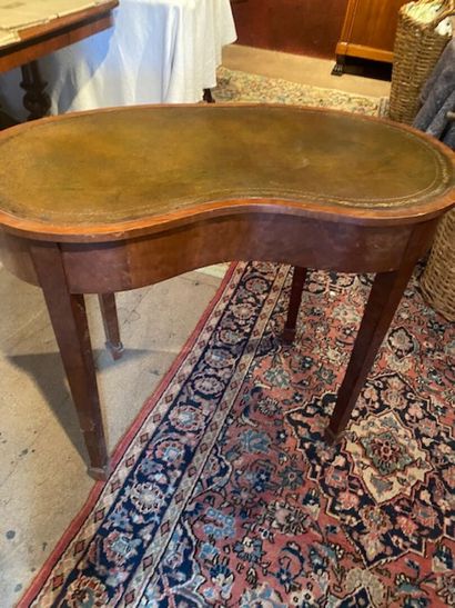 A mahogany and mahogany veneered kidney-shaped...