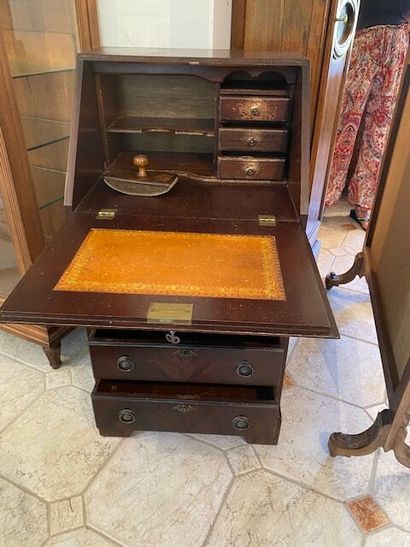 A mahogany and mahogany veneer scriban chest...
