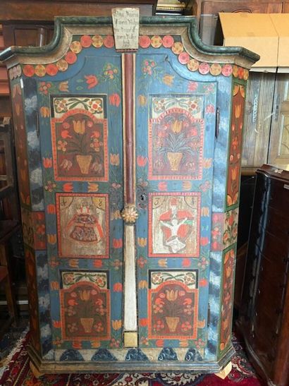 A polychrome lacquered pine wedding armoire
It...