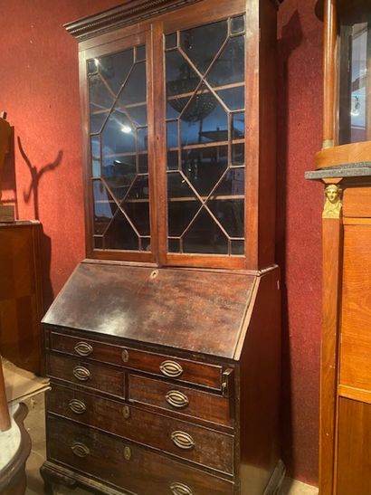 A scriban bookcase in mahogany and mahogany...