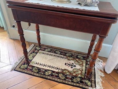 Mahogany and flame mahogany veneer game table.
It...