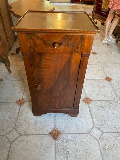 A walnut and walnut veneer bedside cabinet
19th...