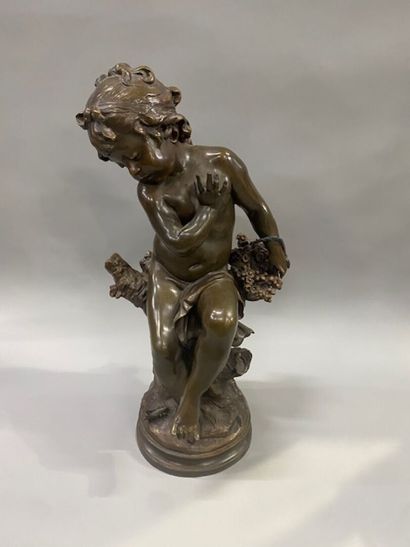 After Auguste MOREAU - A seated putto with...