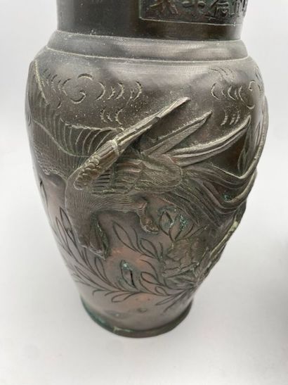 CHINA A pair of bronze vases with brown patina
decorated...