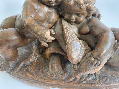Terracotta pair of putti caressing a dove
(missing...