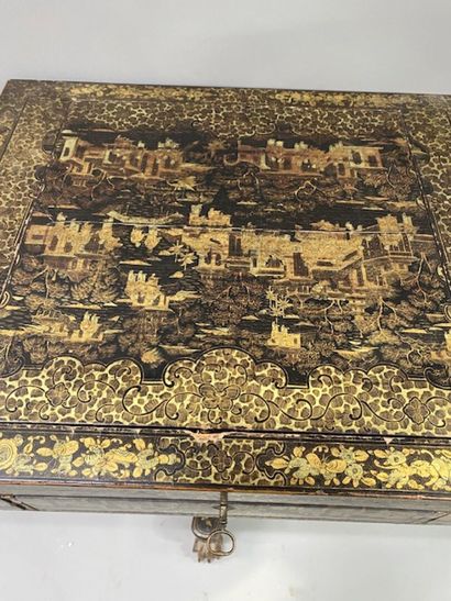 A Coromandel lacquer game table decorated...