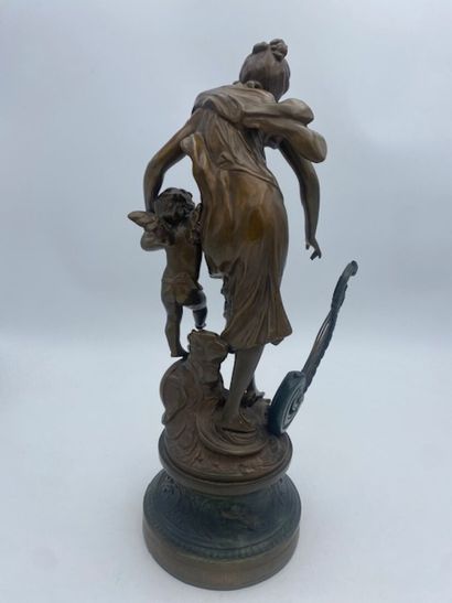 After Auguste MOREAU - A harp player and...