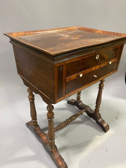 A knitting table in rosewood and violet wood...