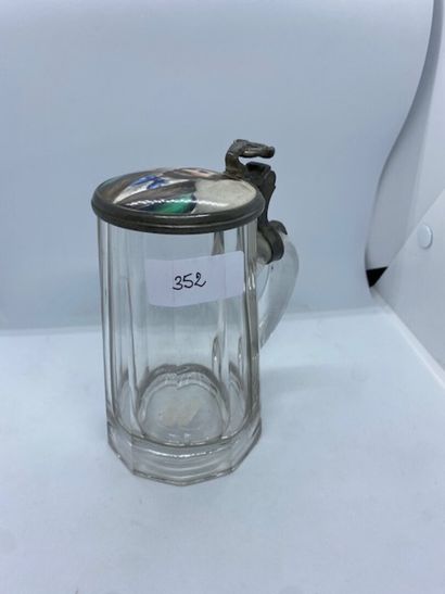 Moulded glass beer mug with pewter lid, decorated...