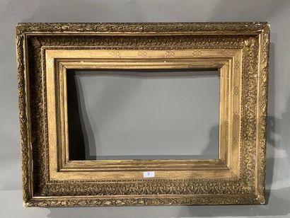 Gilded stuccoed wood frame decorated with...