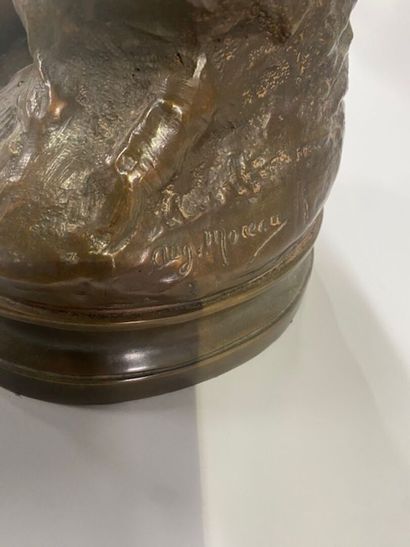 After Auguste MOREAU - A seated putto with...