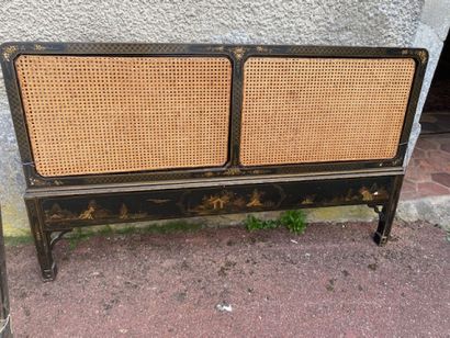 A bed bumper in blackened wood with polychrome...
