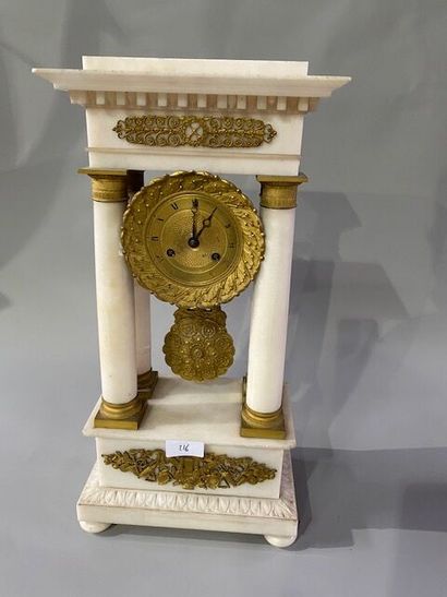 A white marble and chased ormolu portico...