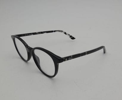CHRISTIAN DIOR, PARIS.
A pair of black plastic...