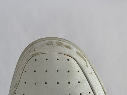 GIVENCHY. 
Pair of Chris Lee white leather...