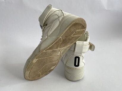 GIVENCHY. 
Pair of Chris Lee white leather...