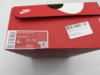 NIKE 
Pair of red and white DUNK LOW CHAMPIONSHIP...