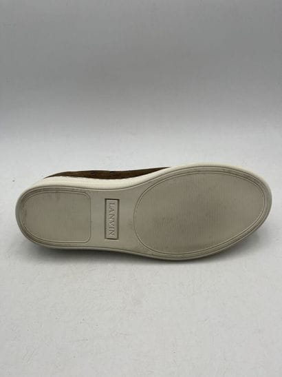 LANVIN PARIS.
A pair of brown suede low-top...
